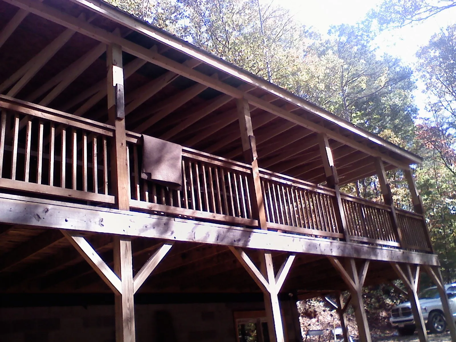 Timber framing under a new elevated porch and deck — Roof Leak Repair in Grassy Creek by Roofing Brothers